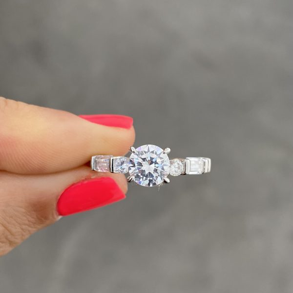 Round Solitaire Baguettes Band