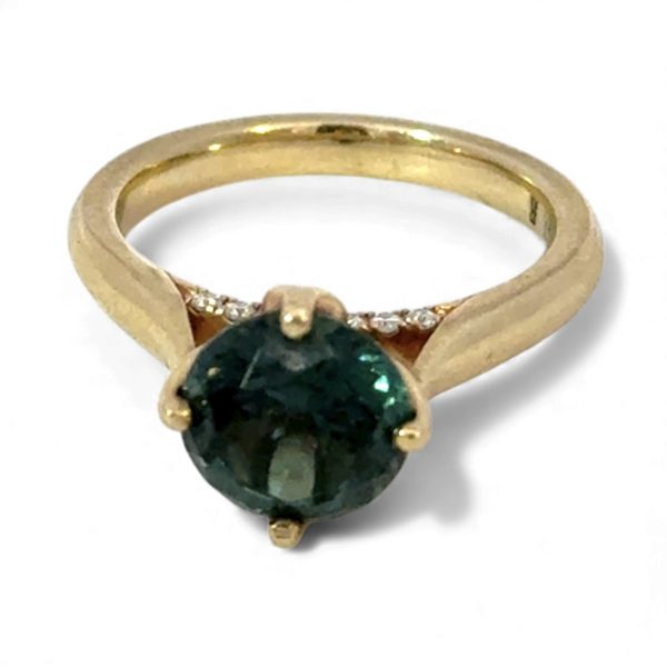 Green Round Solitaire With Hidden Bling